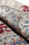 Rolled 5x8 Nain rug showing ivory guard borders and silk highlighted floral detail