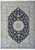 6'7" x 10' Persian Nain rug shown flat overhead, navy field with ivory floral medallion
