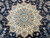 Ivory star medallion close up with sky blue petals, burgundy centers and silk highlights
