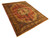 Angled full length view of the red and saffron gold Persian Tabriz rug with floral borders