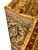 11x15 Persian rug reverse folded back, showing tight hand-knotted rows and cotton foundation weave