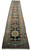 Full length view of 3'5" x 18'3" antique Persian runner showing repeating geometric medallion column