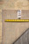 Back of the 9'7" x 14' rug with PIX 26988 tag and tape measure