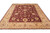 10 x 14 Afghan Ziegler Chobi rug photographed at an angle with wide gold border