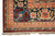 Corner macro of the navy main border with salmon rosettes, ivory flowers and red guard stripes