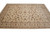 Wide angle of 9' x 12'8" area rug showing symmetrical floral repeat and layered borders