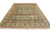 Angled floor view showing sea green medallion panels, gold vines and soft salmon outer border detail