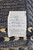 Handwritten weaver tag noting 18'9 x 12 size, Pakistan origin and 100% natural wool