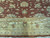 Gold main border detail with tulip sprays, vases and reciprocal trefoil guard stripes