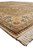 Low angle along the ivory main border of the 8'10" x 12'1" Tabriz rug