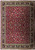 Deep burgundy Persian Mashad rug with all-over floral field, navy border and ivory guard bands