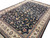 Navy field with pastel palmettes seen from the corner, hand-knotted wool pile, 10x14 Oriental rug