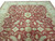 Oversize 9'10" x 14' Ziegler rug viewed lengthwise, repeating vine lattice meeting the ivory main border