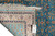 Back corner folded with tag reading rug number 59531 and size 3' x 9'10"