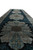 Narrow 3x10 silk runner viewed lengthwise, ivory and gold medallions glowing against the black field