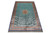 6' x 9' hand-knotted silk rug photographed at an angle showing teal field and navy outer border