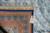Back of the rug with hand woven tag reading rug number 59281 and silk foundation