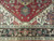 Border study showing ivory spandrel, dark brown main border and floral rosette guard stripes