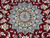 Light blue star medallion detail knotted in fine wool and silk on red ground