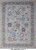 Full view of 10x14 Oushak rug with light blue field, gray border and rust palmettes