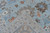 Back of the rug showing knot density, ivory fringe and the clear all-over Oushak pattern