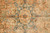 Center field detail with teal rosette, ivory palmettes and curling copper floral vinework