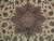 Close-up of the lobed brown medallion with pale aqua tracery and rust rosettes on ivory