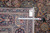 Tape measure across the back beside the tag confirming 9'1" x 13'2" Khorassan rug size