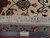 Back of the 6'6" square Tabriz rug with ruler showing approximately 400 knots per square inch