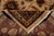 Folded corner revealing cotton foundation, even knot structure and ivory hand-knotted fringe