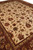 Corner perspective of the 12x15 oversize rug showing floral field meeting triple border