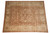 Overhead display of Ziegler design area rug with all over vinework on warm brown ground