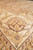 Low angle across ivory border lotus flower with chocolate brown outlines and cream highlights