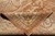 Folded corner revealing tight hand-knotted back and clear pattern on the reverse side
