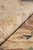 Rolled edge close-up showing dense wool pile, soft handle and subtle natural color variation