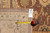 Back of rug with tape measure and tag reading 10.1 x 13.7 genuine hand woven