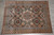 9' x 12' Zigler Chobi rug photographed flat on grey tile showing full Mamluk layout