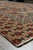 Side profile of the multi color wool rug edge showing dense hand-knotted pile and selvage