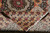 Folded back corner showing the reverse of the weave, knot definition and fringe finishing