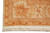 Border detail with large acanthus leaves, rust guard stripes and natural ivory cotton fringe