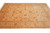Angled view of the Chobi Peshawar rug highlighting apricot palmettes across a soft cream field
