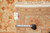 Back tag and tape measure confirming the 9x12 hand-knotted Chobi Ziegler rug dimensions