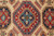 Detail of stepped octagonal medallion with sky blue center, cream palmettes and green rosette