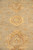 Angled field view highlighting a gold octagonal rosette anchored by curling arabesque vines