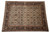 9'2 x 12'2 Jaipur rug photographed flat, all-over floral lattice inside deep black border