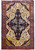 Antique 4'5" x 7' Persian Sarouk Ferahan rug with ivory field and navy lobed medallion