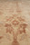 Field close-up of stacked rosette and palmette column in terracotta, taupe and ivory handspun wool