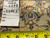 Inventory tag reading rug number 6573, size 3.7 x 5.5, beside ruler on reverse weave
