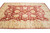 10 x 14.8 oversize Ziegler rug photographed lengthwise showing all-over palmette vines on crimson field