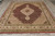 8'2 x 10 Indian Tabriz Mahi rug shown full length with ivory cotton fringe